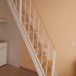 Escaleras peldaño compartido